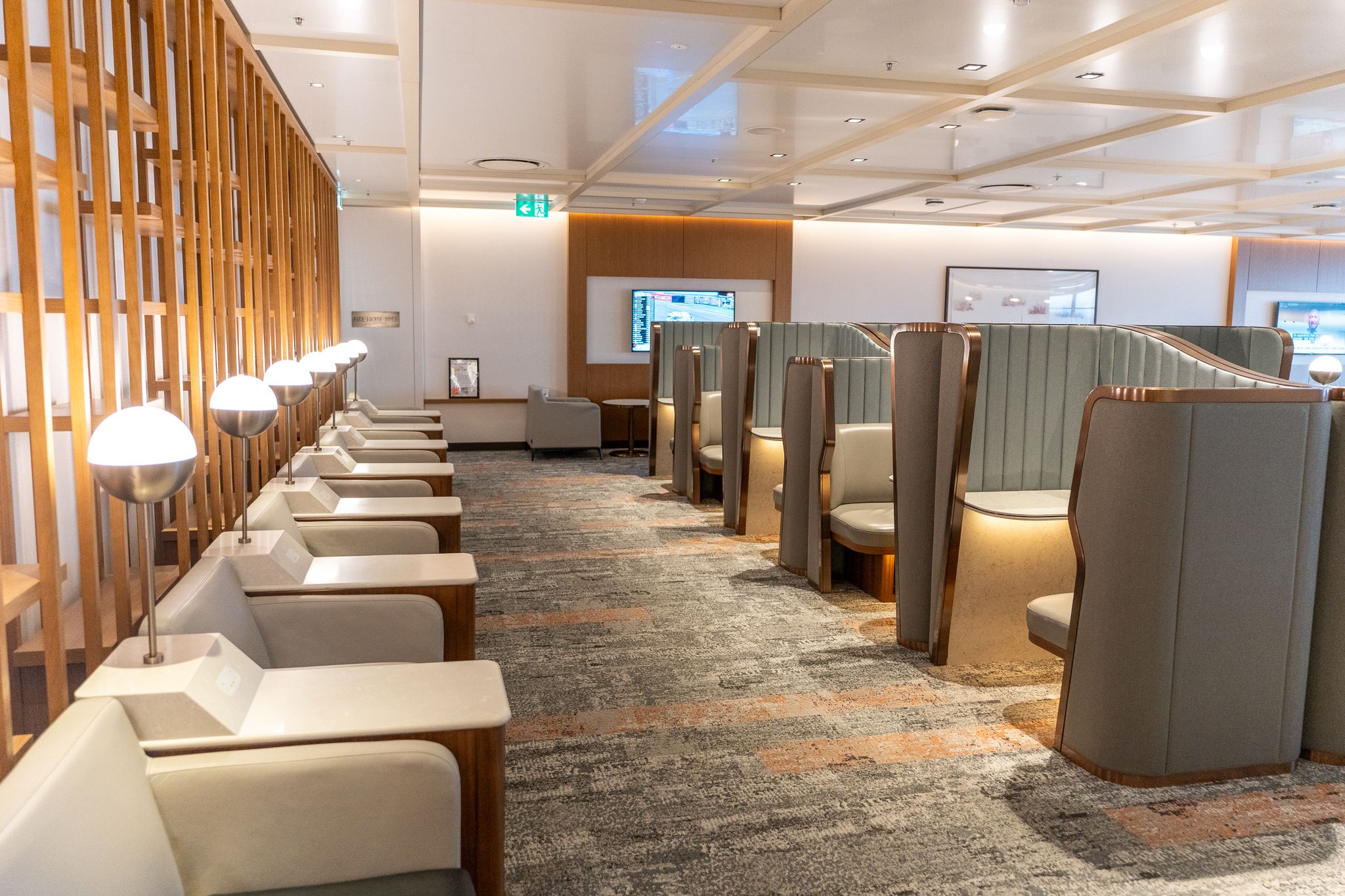 Lounge seating with semi-private booths and armchairs