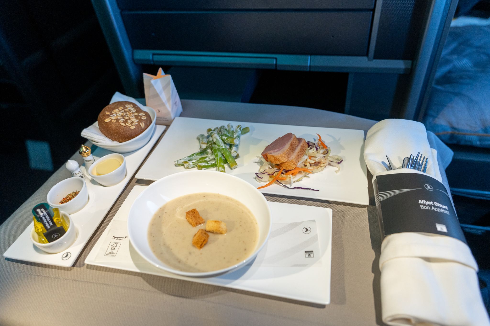 Turkish Airlines business class meal tray with soup, tuna, asparagus and bread