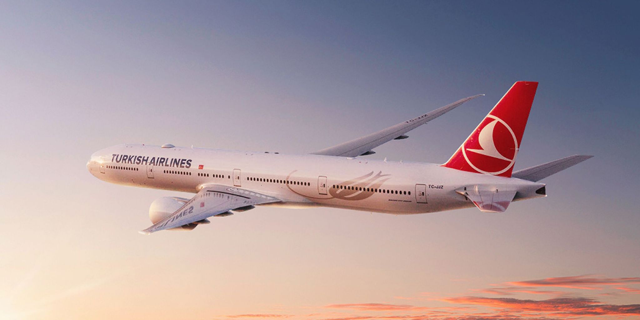 Turkish Airlines Boeing 787 in flight at sunset