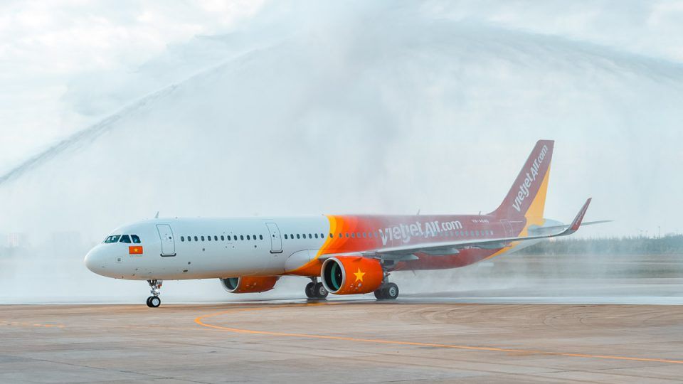 VietJet aircraft passing through a water cannon salute on arrival