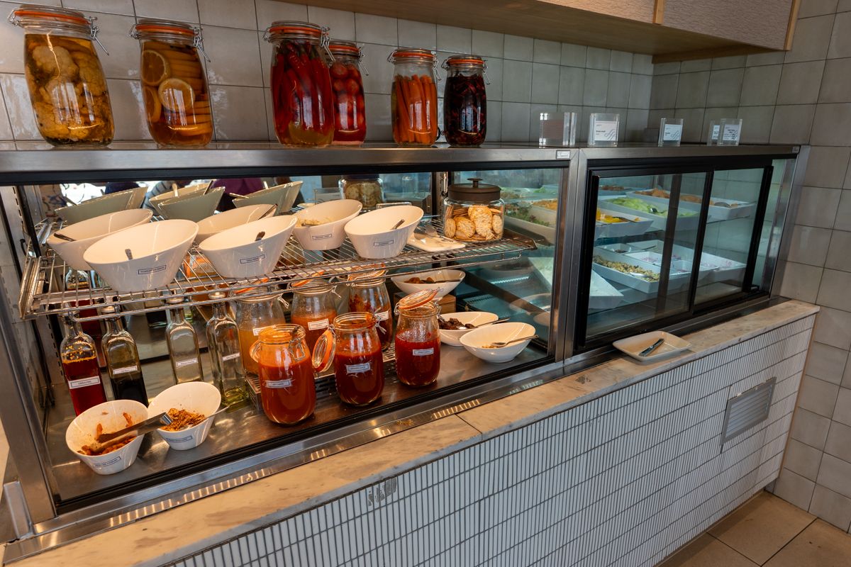 Food and condiment jars on display in the SkyTeam Lounge Sydney