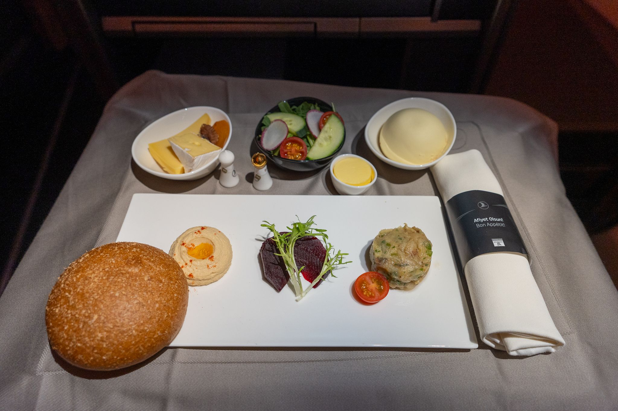 Turkish Airlines business class starter tray with mezze, cheese, salad and bread