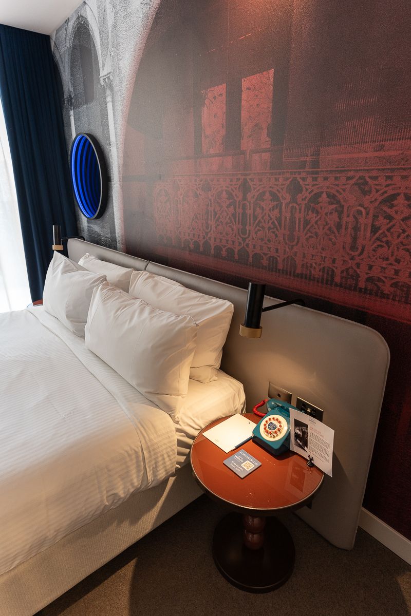 Bedside table with a retro telephone at Hotel Indigo Sydney Potts Point