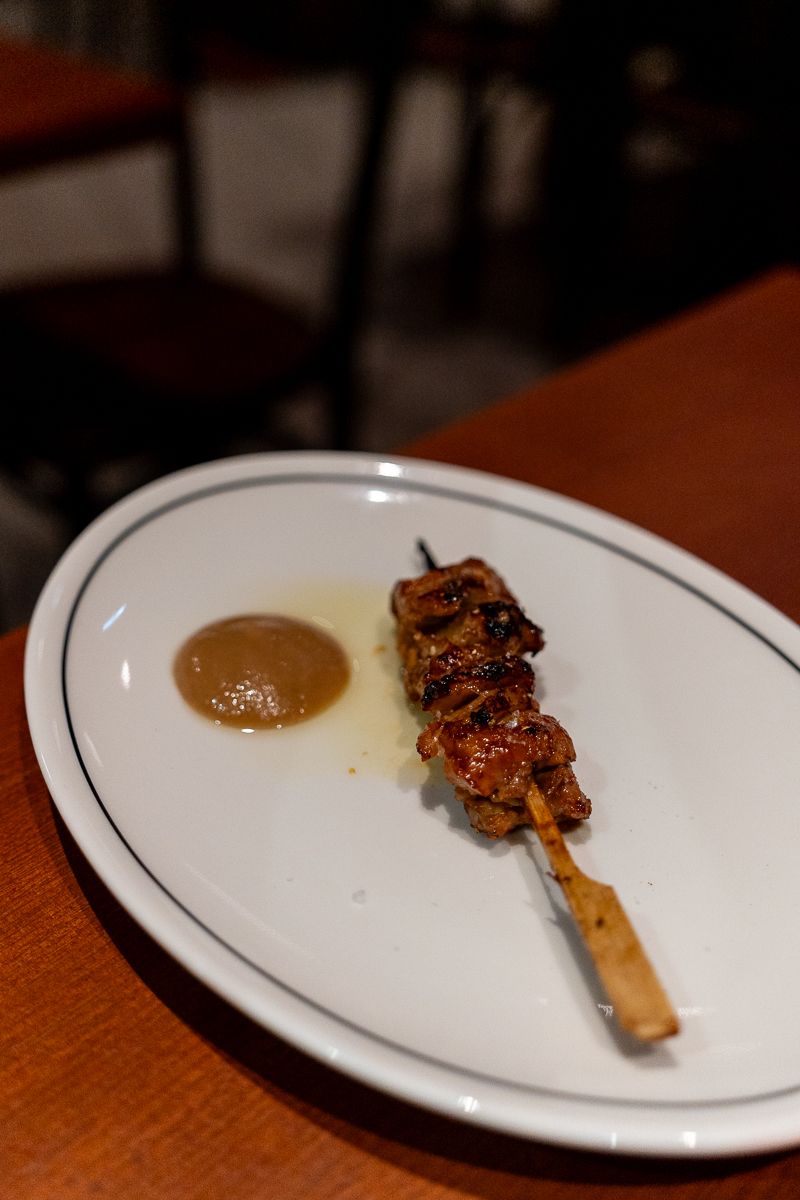 Grilled skewer with dipping sauce at Hotel Indigo Sydney