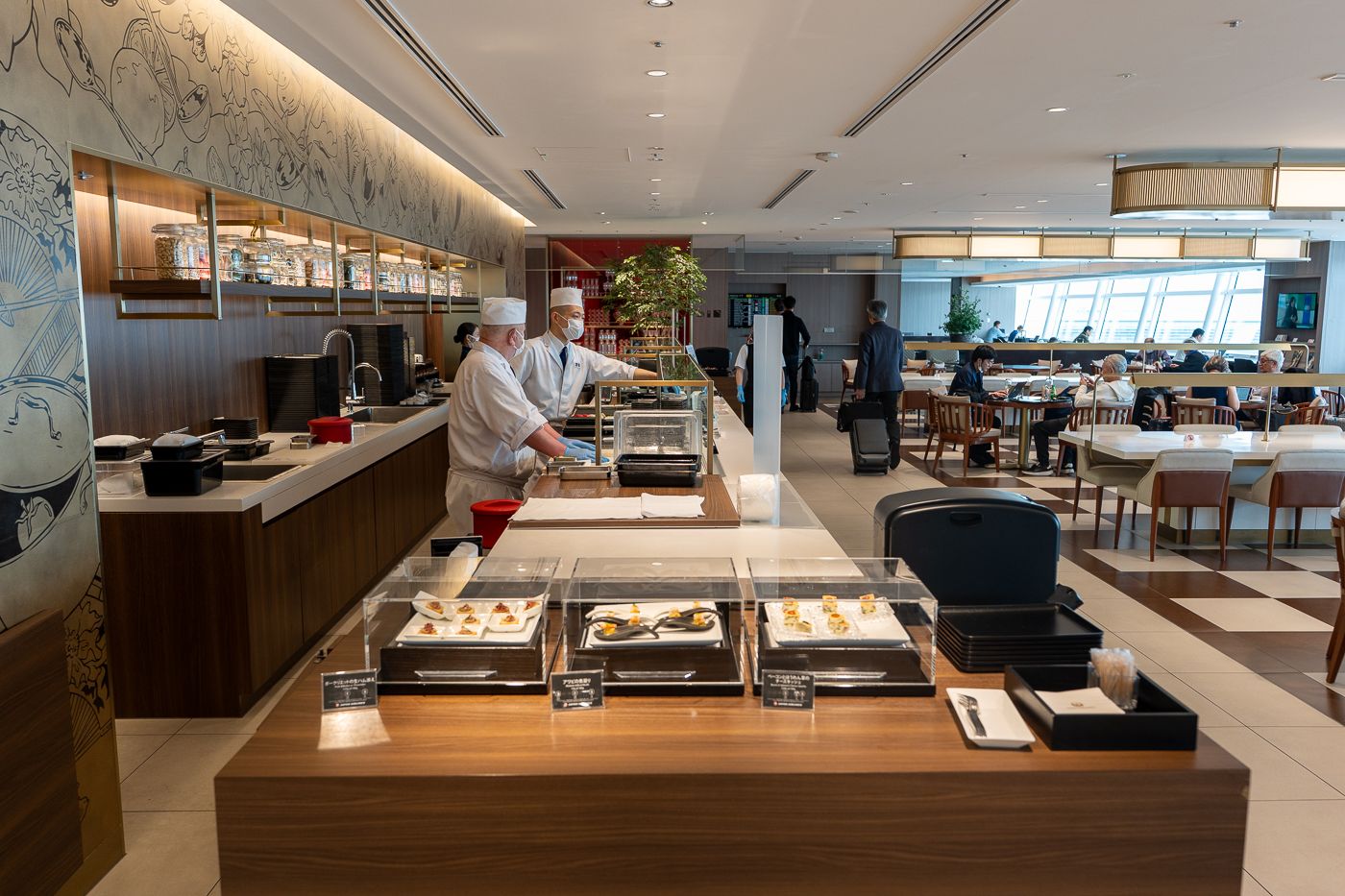 Chefs at the dining counter in the Japan Airlines lounge in Tokyo