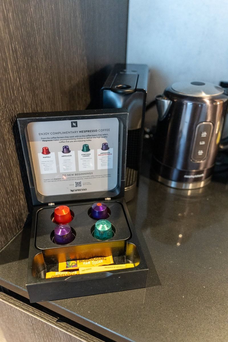Nespresso coffee pods and kettle in a Mövenpick Hobart room