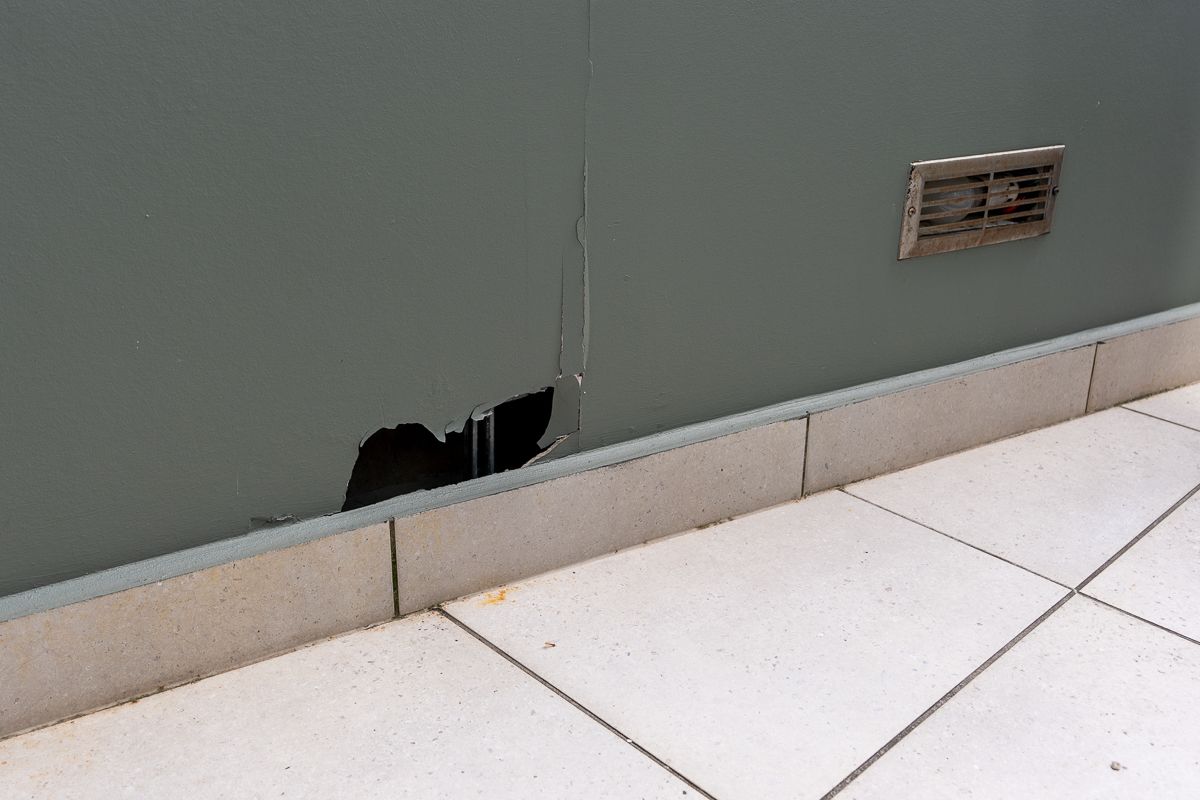 Damaged wall and skirting on the terrace at Hotel Indigo Sydney Potts Point