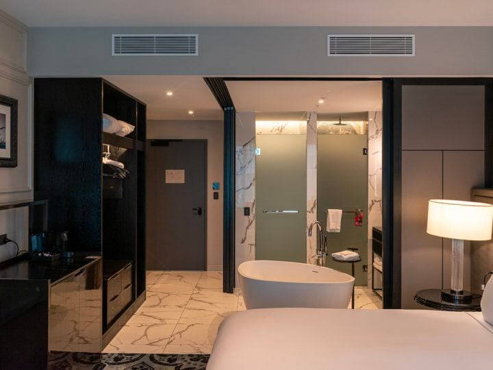Luxury King room with a freestanding bathtub at Sofitel Adelaide