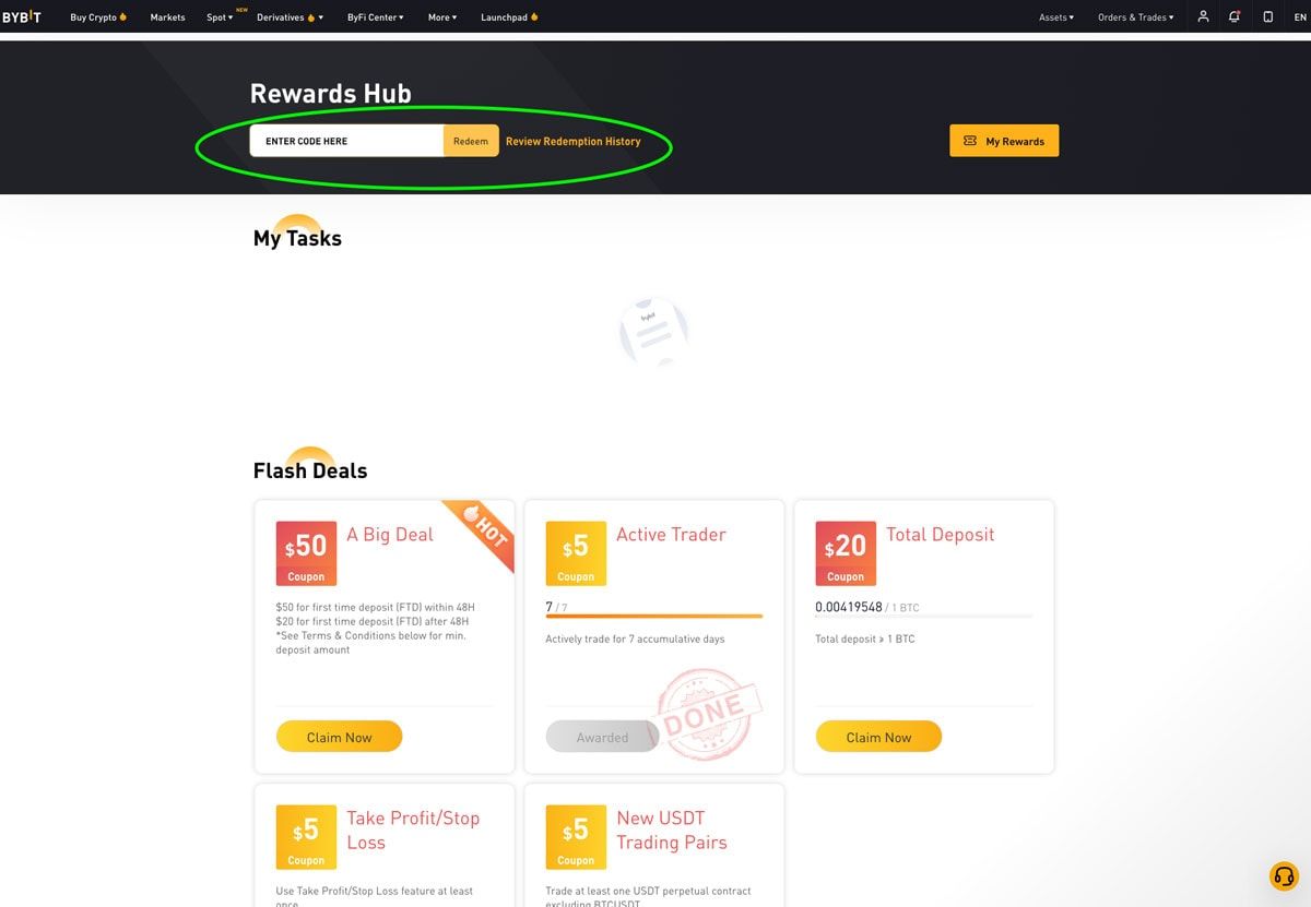 Bybit Rewards Hub page with the voucher code field circled