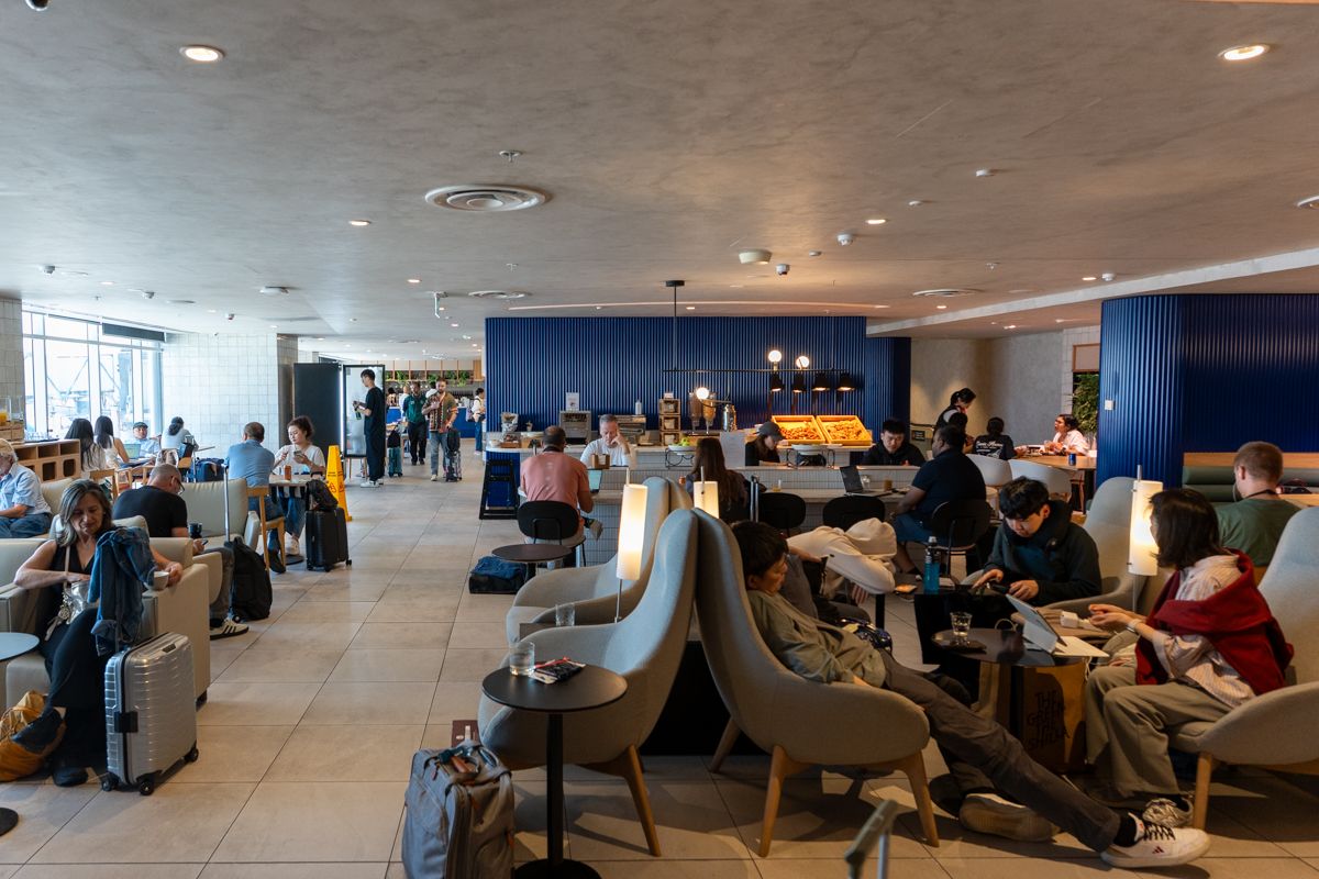 Busy seating area in the SkyTeam Lounge at Sydney Airport