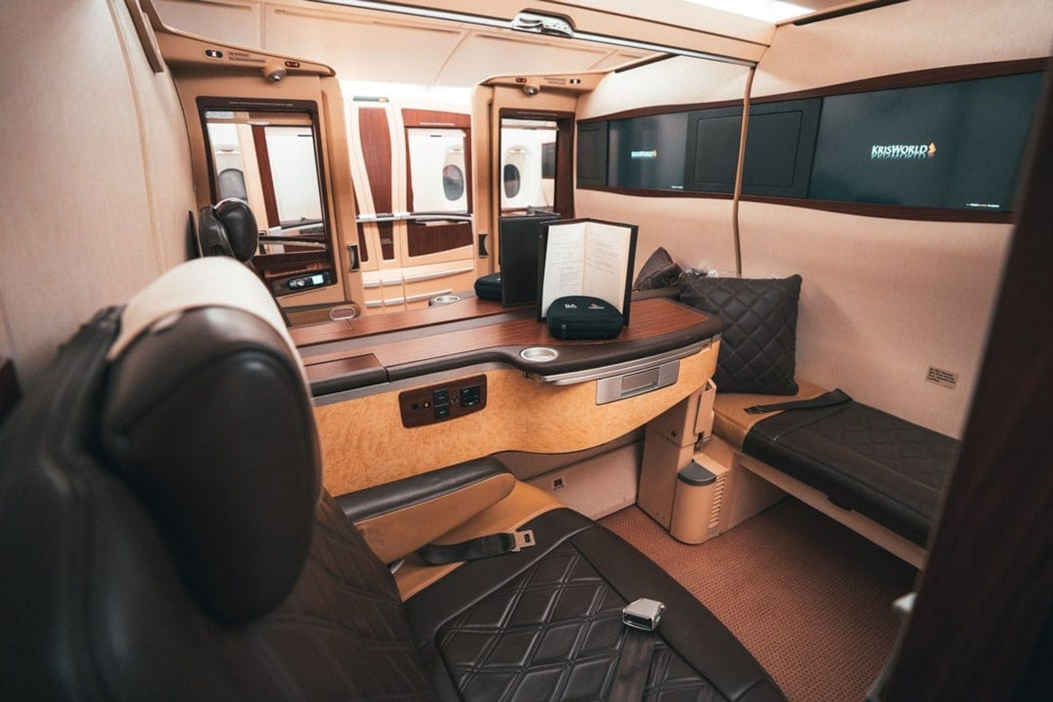 Singapore Airlines Suites cabin with the KrisWorld screen