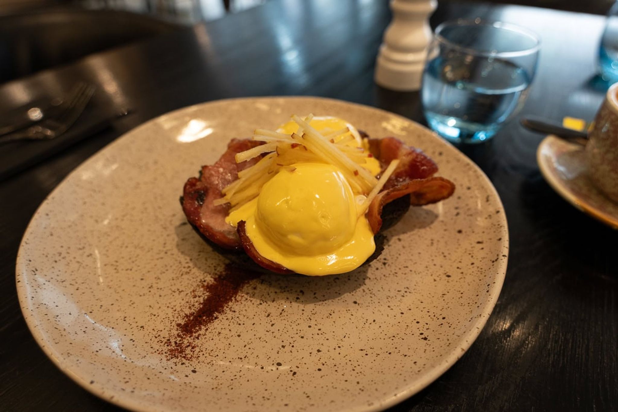 Eggs benedict with bacon at breakfast, Mövenpick Hotel Hobart
