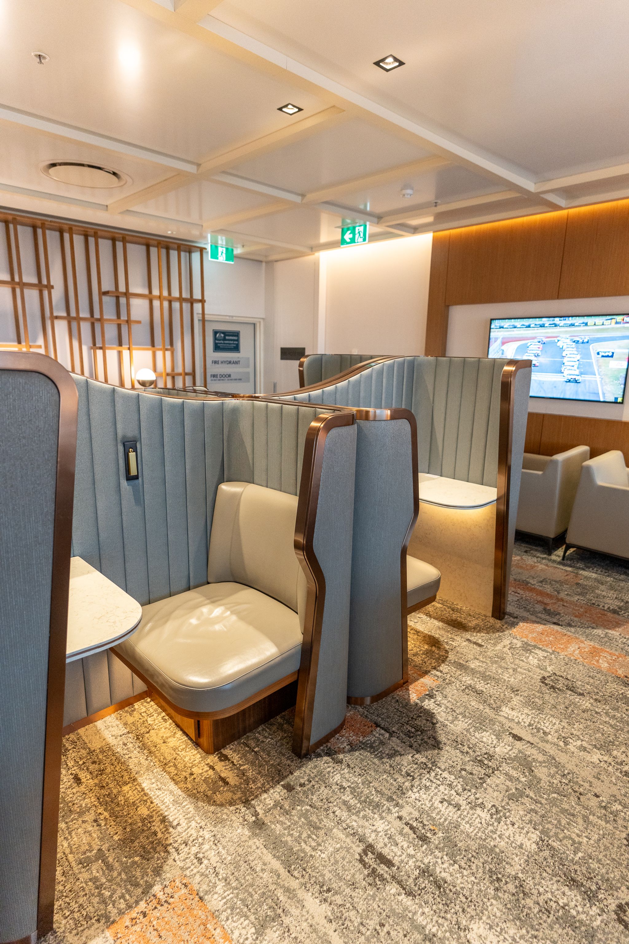 Semi-enclosed work pods in the SilverKris Lounge, Sydney