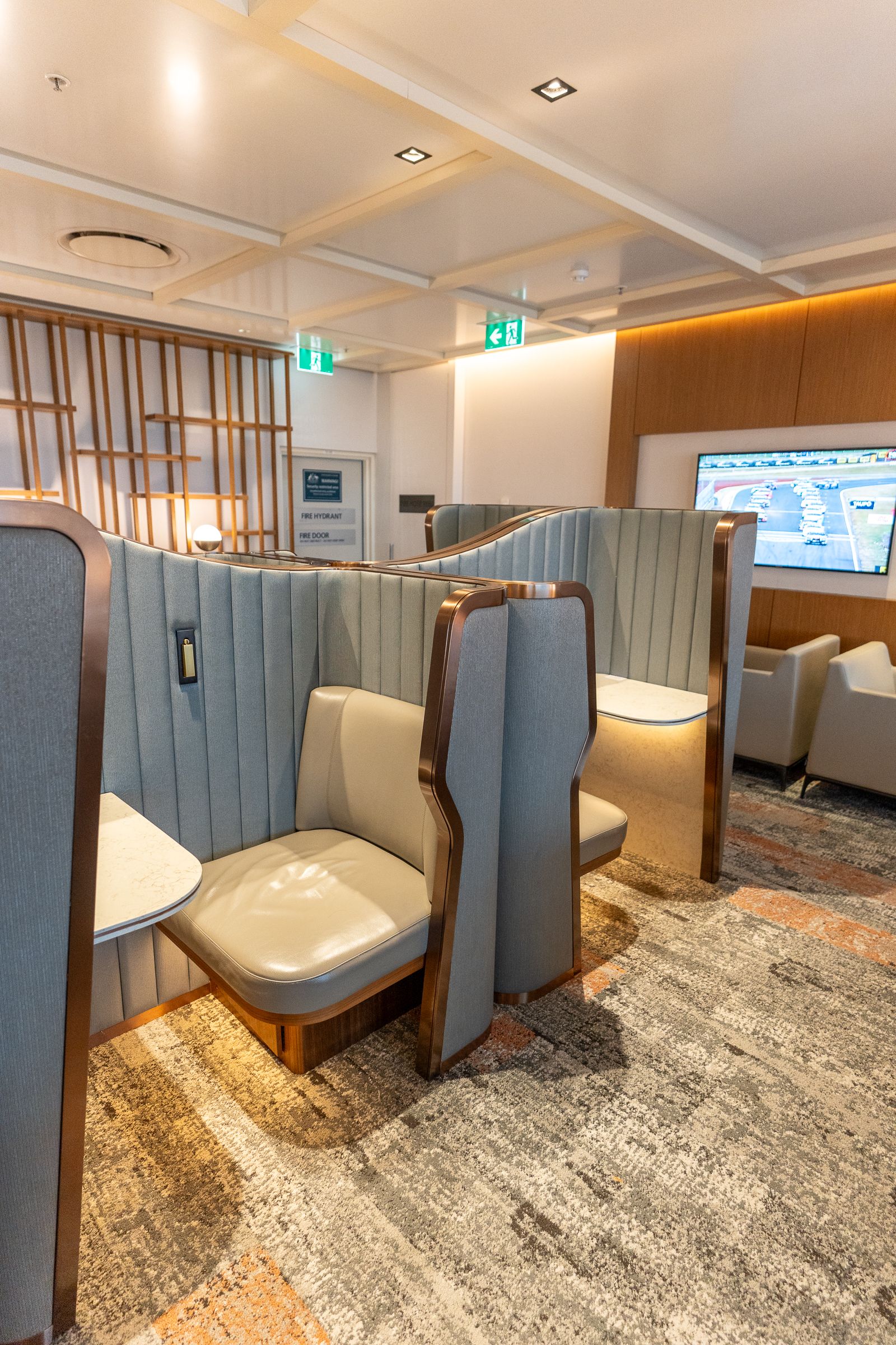Semi-enclosed work pods in the SilverKris Lounge, Sydney