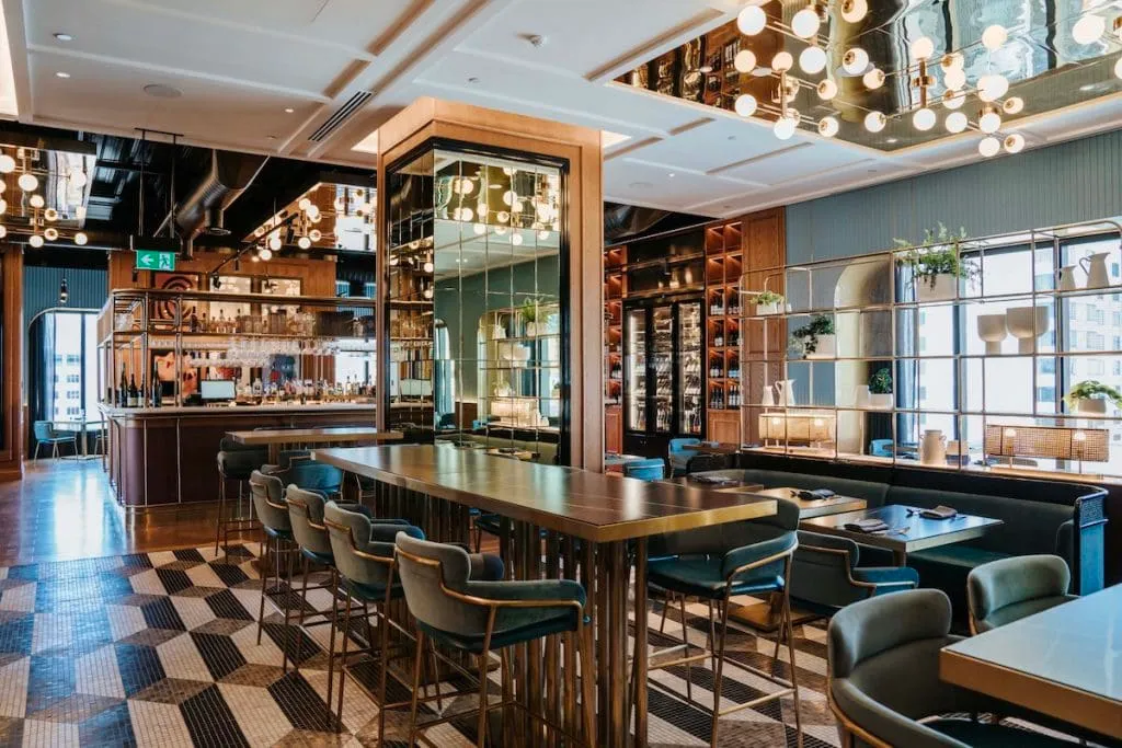 Restaurant and bar at Sofitel Adelaide with a checkerboard floor