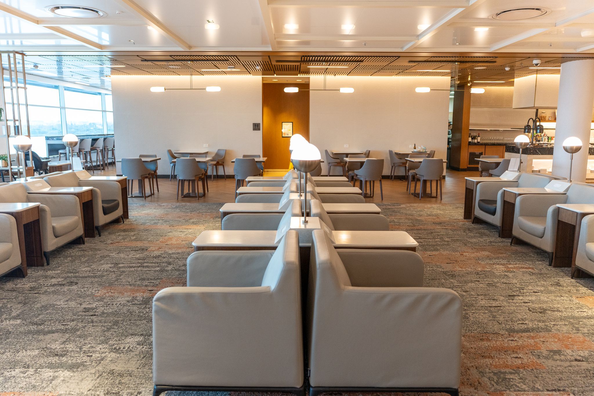 Cream leather armchairs in the Singapore Airlines SilverKris Lounge, Sydney