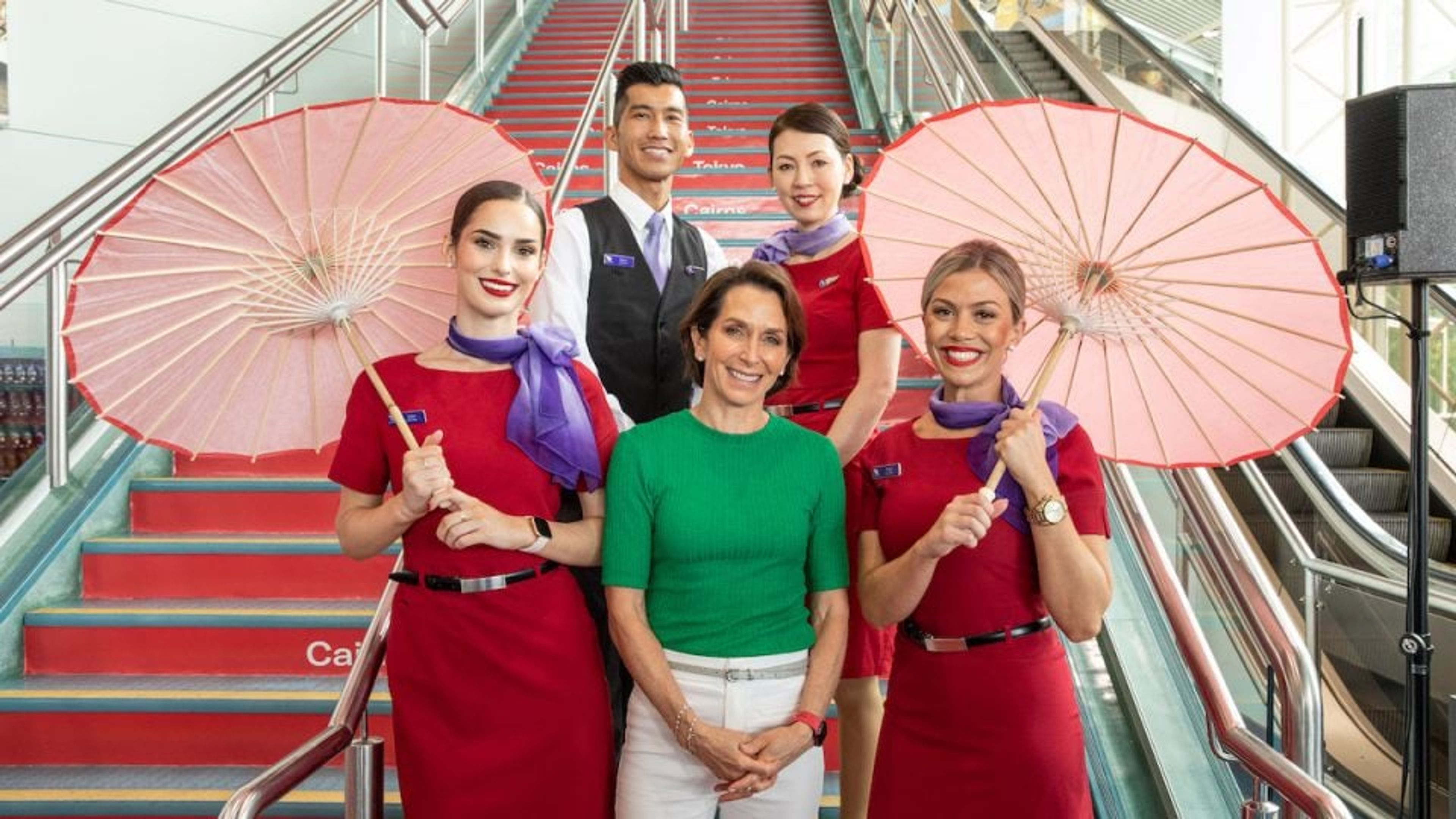 Flight Attendant is happy to assist their passengers.