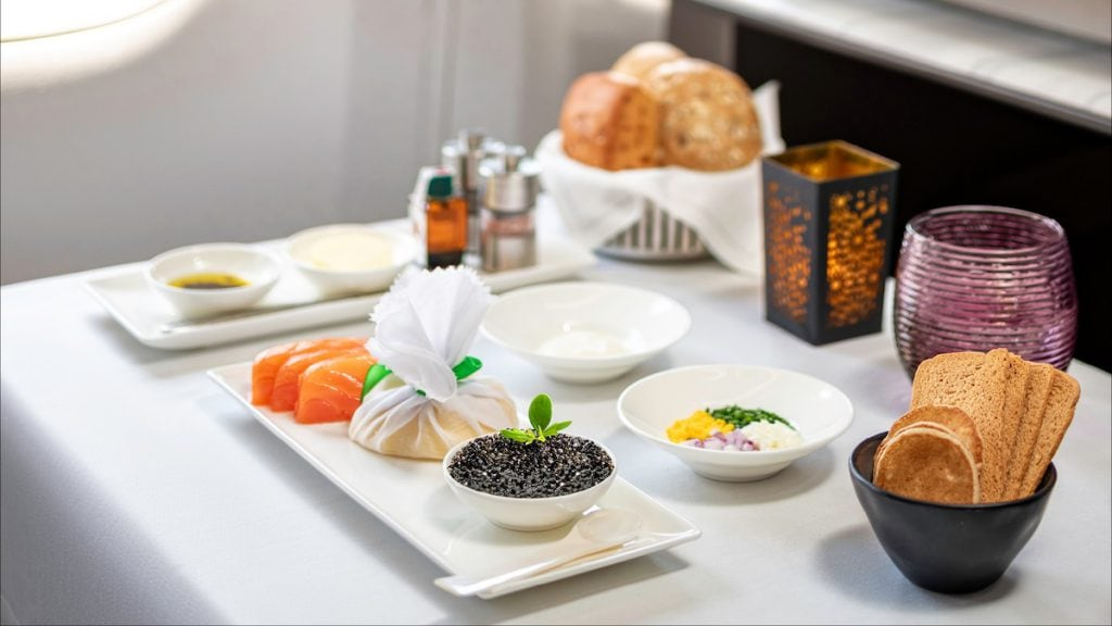 Caviar service with smoked salmon in Qatar Airways business class